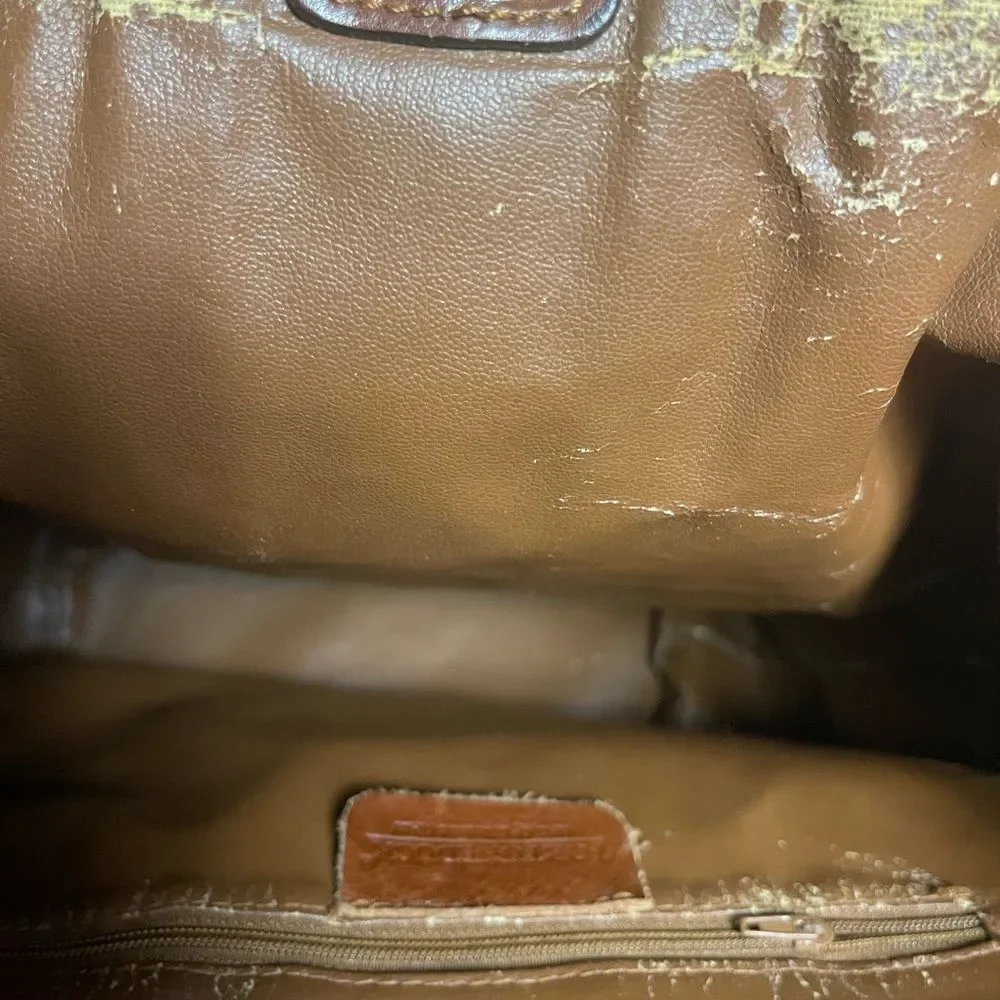 Fortune Duck vintage leather Brown sling back bucket style bag.